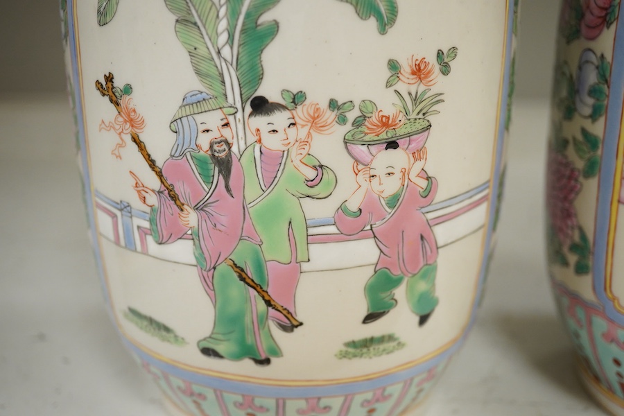 A pair of Chinese famille rose vases, 30cm high